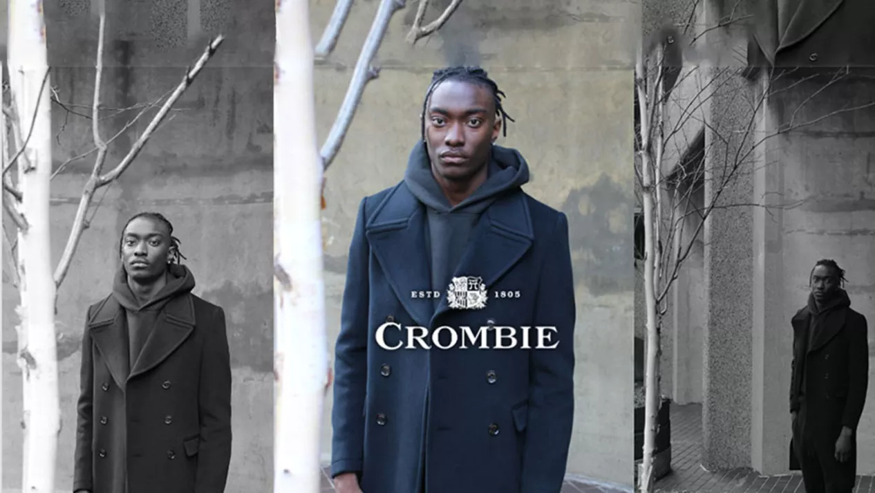 Male model outdoors with showcasing clothing with Crombie logo